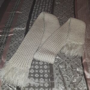 3/$20 Beautiful Crocheted scarf extra long.